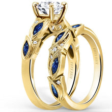 Load image into Gallery viewer, Kirk Kara Yellow Gold &quot;Dahlia&quot; Marquise Cut Blue Sapphire Diamond Engagement Ring Set Angled View 
