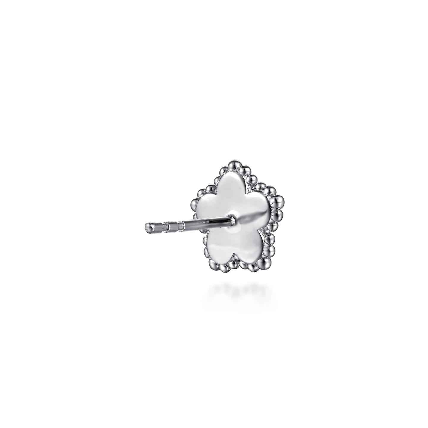Back detail of a single Gabriel & Co. Bujukan sterling silver diamond flower stud earring with post and friction back