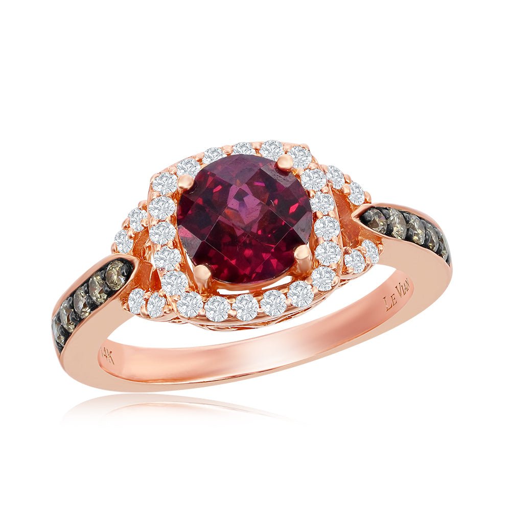 Le Vian Chocolatier Raspberry Rhodolite Ring Featuring a 1.20 Carat Round Cut Raspberry Rhodolite Center Stone, 1/5 Carats Round Cut Chocolate Diamonds and 1/4 Carats Round Cut Vanilla Diamonds Set in 14K Strawberry Gold. Tag WJCG 19.