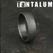 Load and play video in Gallery viewer, Benchmark &quot;Tantalum&quot; Stone Finish Comfort Fit Grey &amp; Black Wedding Band
