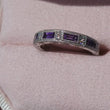 Load and play video in Gallery viewer, Kirk Kara White Gold &quot;Charlotte&quot; Baguette Cut Purple Amethyst Diamond Wedding Band Full Shot Video in Box 
