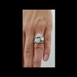 Load and play video in Gallery viewer, Kirk Kara White Gold &quot;Dahlia&quot; Green Tsavorite Garnet Leaf Diamond Engagement Ring Video On Model Hand
