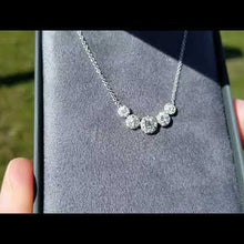 Load and play video in Gallery viewer, Gabriel &amp; Co. Five Halo Diamond Necklace
