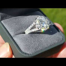 Load and play video in Gallery viewer, Gabriel &amp; Co. &quot;Coco&quot; Round Large Diamond Halo Engagement Ring
