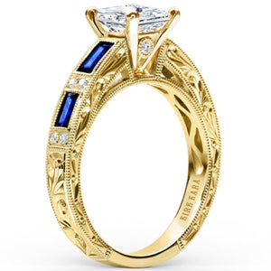 Kirk Kara Yellow Gold "Charlotte" Blue Sapphire Baguette and Diamond Engagement Ring Angled Side View