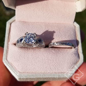 Kirk Kara White Gold "Charlotte" Kite Cut Blue Sapphire Diamond Engagement Ring Set Top View In Box