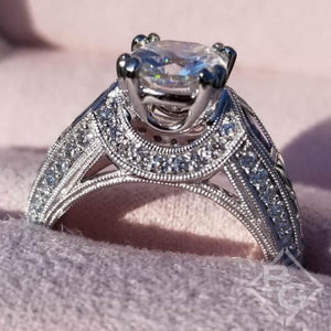 Kirk Kara White Gold "Charlotte" Kite Cut Blue Sapphire Diamond Engagement Ring Close Up Side View In Box