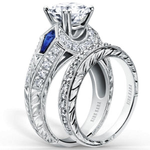 Kirk Kara White Gold "Charlotte" Kite Cut Blue Sapphire Diamond Engagement Ring Set Angled Side View