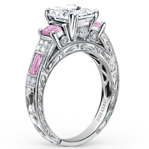 Kirk Kara White Gold "Charlotte" Pink Sapphire Emerald Cut Diamond Three Stone Engagement Ring Angled Side View