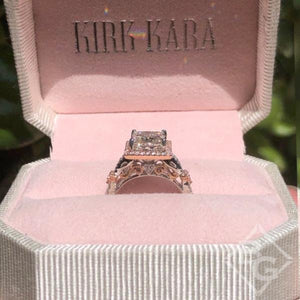 Kirk Kara White & Rose Gold Pirouetta Large Princess Cut Halo Diamond Engagement Ring Side View In box 