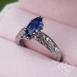 Load image into Gallery viewer, Kirk Kara Stella Marquise Cut Blue Sapphire Engraved Engagement Ring
