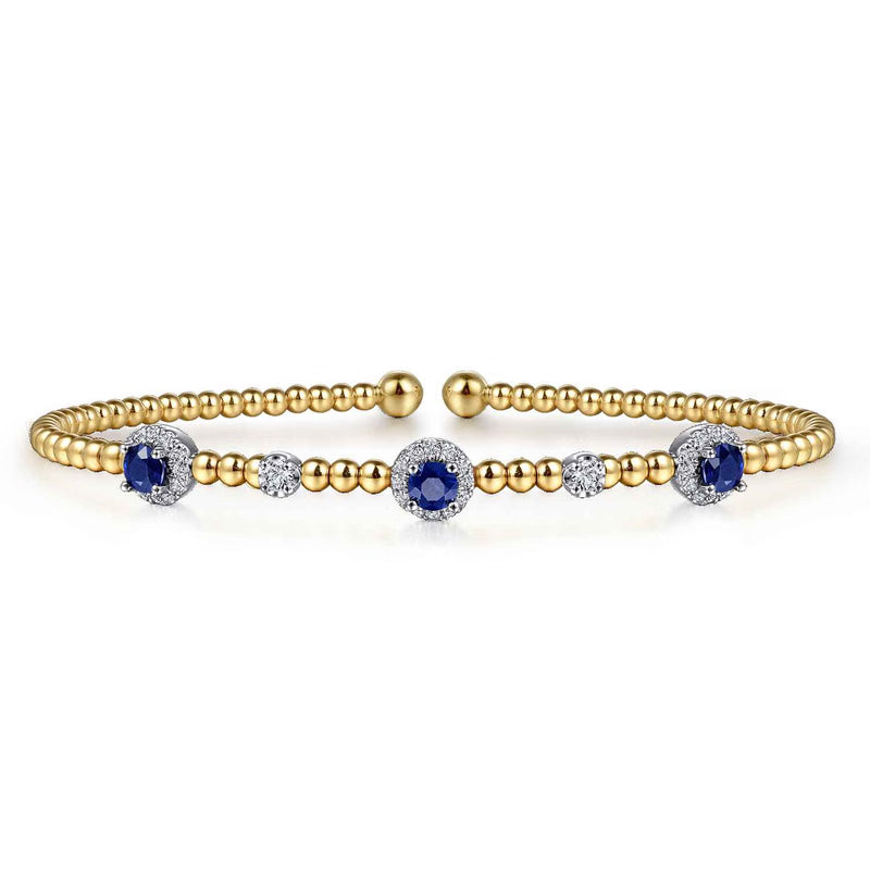 Gabriel & Co. BG4438 Bujukan bangle in 14K white and yellow gold with a blue sapphire and diamond halo