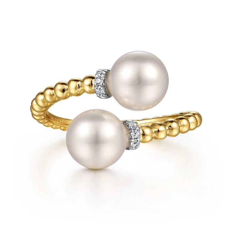 Gabriel & Co. LR52200 Bujukan bypass ring with two pearls on pave diamond collars and a beaded yellow gold shank