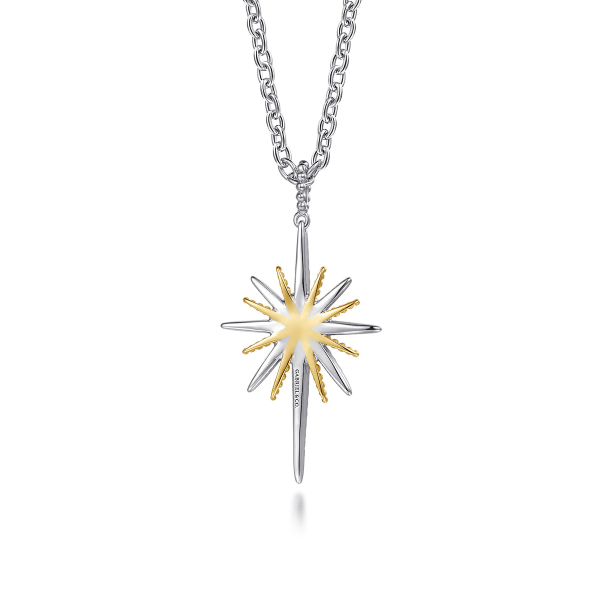 Back of the Gabriel & Co. Bujukan starburst pendant showing polished sterling silver and 14K yellow gold