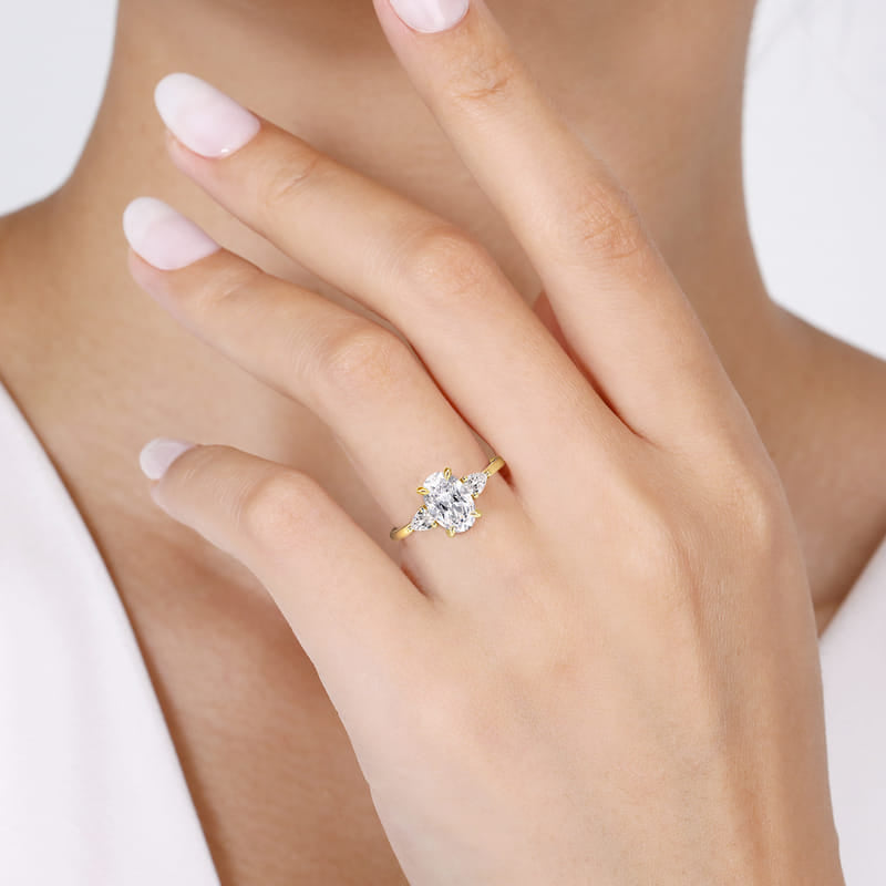 Gabriel & Co. Yellow Gold Sima Three Stone Diamond Engagement Ring on Hand