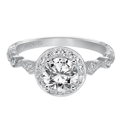 Artcarved Crystal halo engagement ring lying flat, showing milgrain halo and marquise-shaped diamond stations on the shoulders