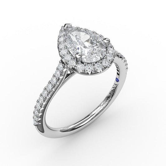 Fana 14K white gold pear halo classic prong set diamond engagement ring formed by round diamonds prong set in the pear cut halo and band. This ring features 0.34 carats total weight of round cut diamonds.