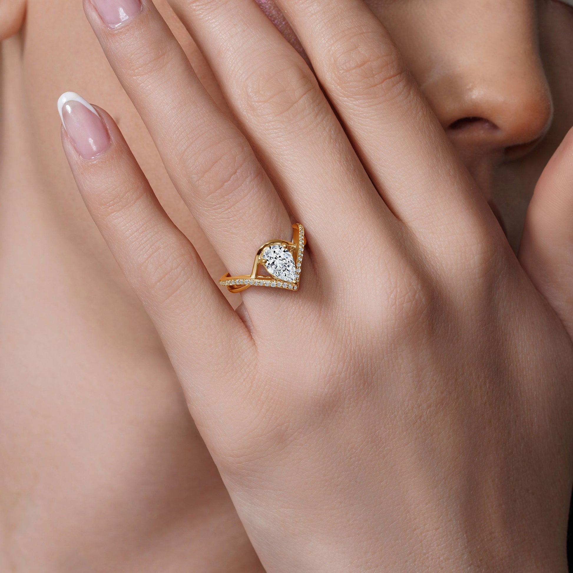 Barkev's Yellow Gold Split Shank Twist Pear Cut Diamond Engagement Ring on Finger on Finger