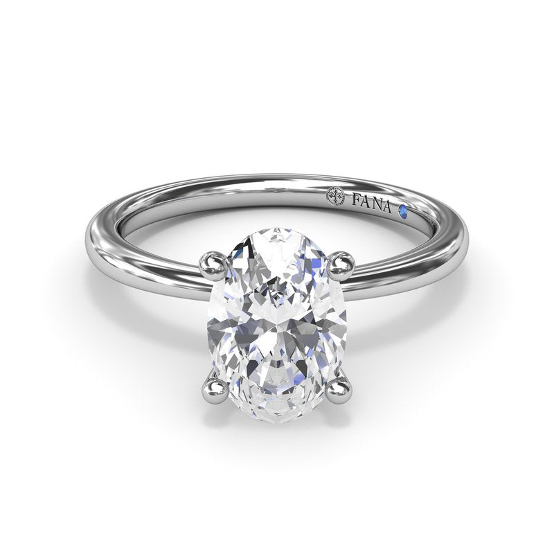 Fana 14K White Gold Oval Cut Four Prong Diamond Collar Solitaire Engagement Ring Featuring 0.06 Carats Round Cut Diamonds Set in the Diamond Collar.