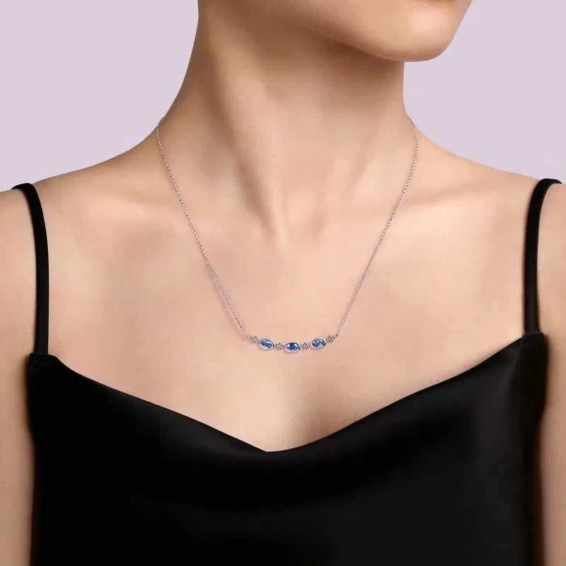 Gabriel & Co. Blue Topaz & Diamond Pendant Necklace in Sterling Silver When Worn