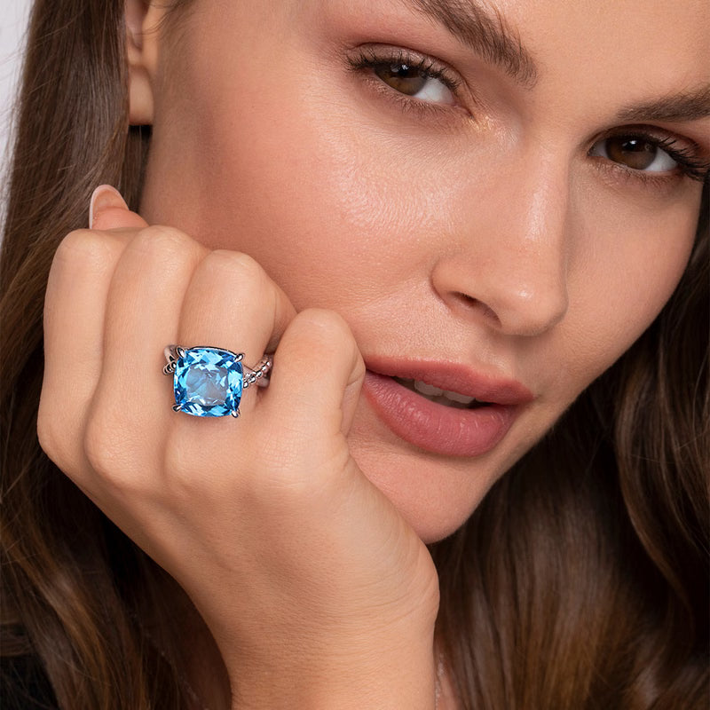 Gabriel & Co. Bujukan Cushion Blue Topaz Twisted Ring in Sterling Silver  on a Finger