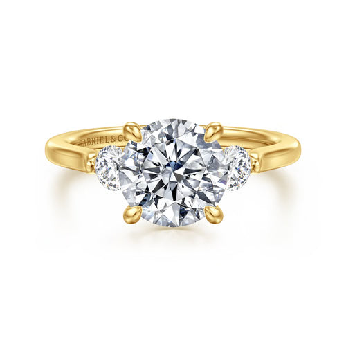 Gabriel & Co. Madison round three stone Lotus engagement ring in 14K yellow gold in 14K yellow gold with 0.30 ct side diamonds at Ben Garelick Jewelers Top
