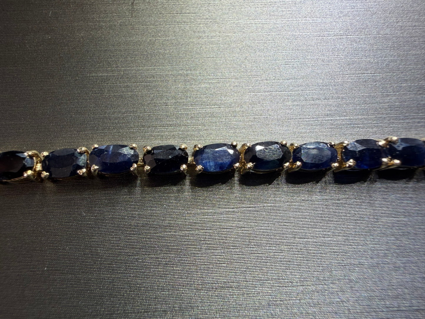 Estate Dark Blue Sapphire Bracelet in 14K Yellow Gold - Angled View
