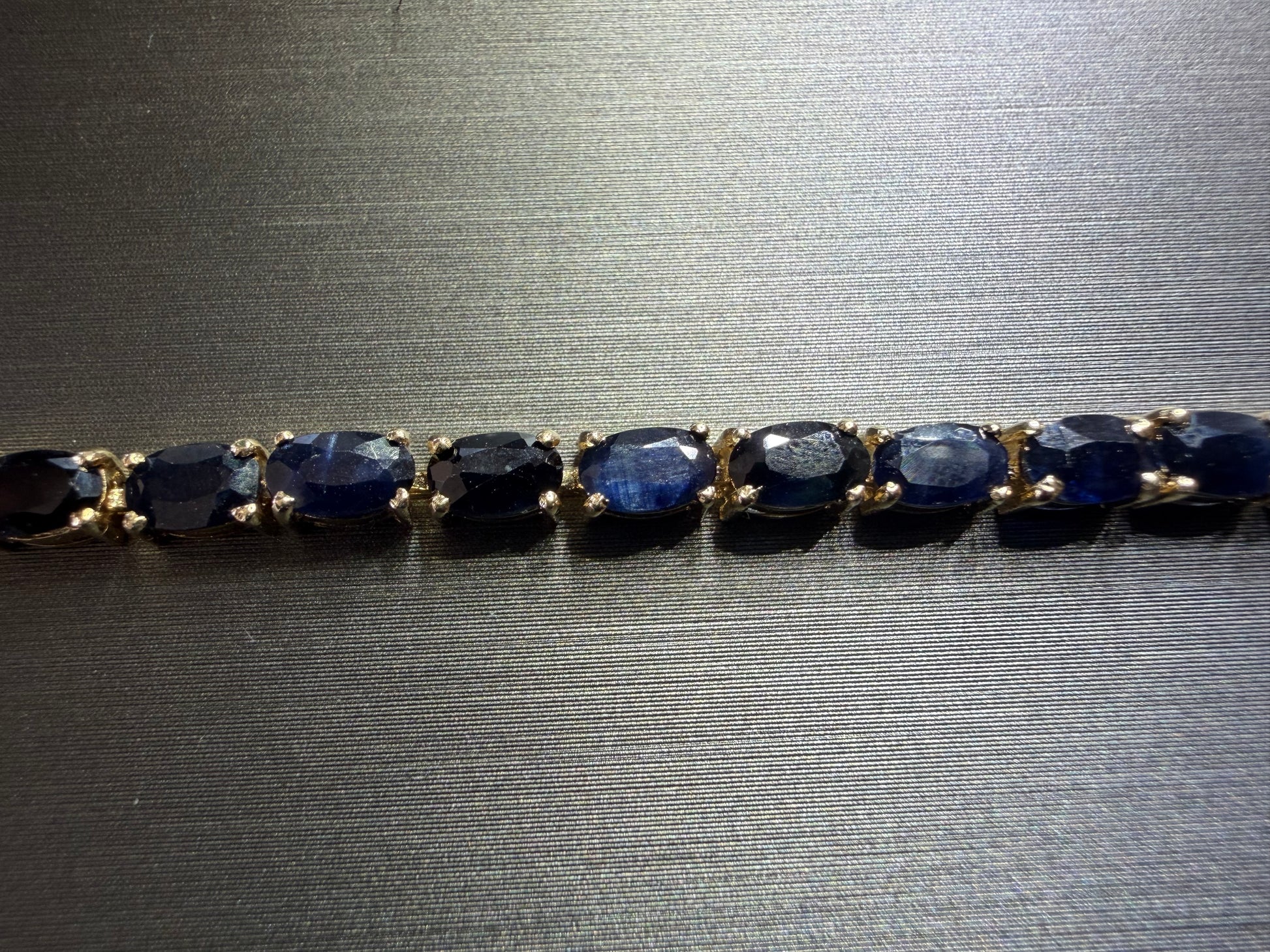Estate Dark Blue Sapphire Bracelet in 14K Yellow Gold - Angled View
