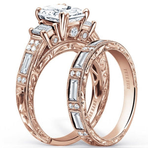 Kirk Kara Rose Gold "Charlotte" Emerald Cut Three Stone Diamond Engagement Ring Set Angled Side View