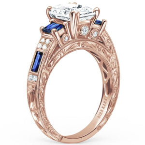 Kirk Kara Rose Gold "Charlotte" Blue Sapphire Diamond Three Stone Engagement Ring Angled Side View 