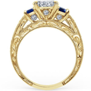 Kirk Kara Yellow Gold "Charlotte" Blue Sapphire Diamond Three Stone Engagement Ring Side View 