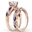 Load image into Gallery viewer, Kirk Kara Rose Gold &quot;Dahlia&quot; Marquise Cut Blue Sapphire Diamond Engagement Ring Set Angled View
