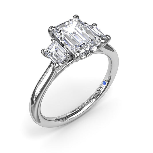 Fana 14K White Gold Three Stone Emerald Cut Three Stone Diamond Engagement Ring Featuring 0.40 Carats Total Weight Emerald Cut Side Diamonds.