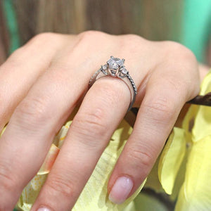 Barkev's Three Stone Round Cut Diamond Engagement Ring