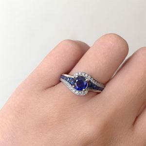Barkev's Blue Sapphire Halo Twist Diamond Engagement Ring