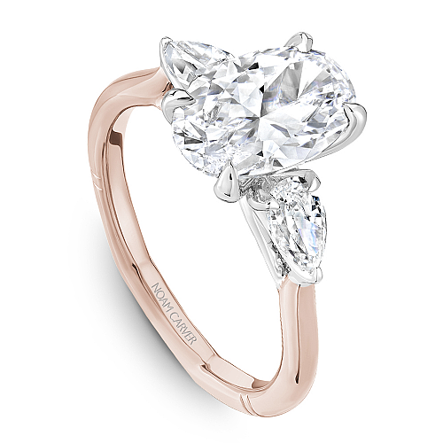 Angled view of the Noam Carver Atelier A092-02 three stone ring in two-tone rose & white gold, pear side diamonds on a soft square Euro shank