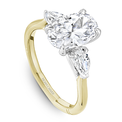 Angled view of the Noam Carver Atelier A092-02 three stone ring in two-tone yellow & white gold, pear side diamonds on a soft square Euro shank