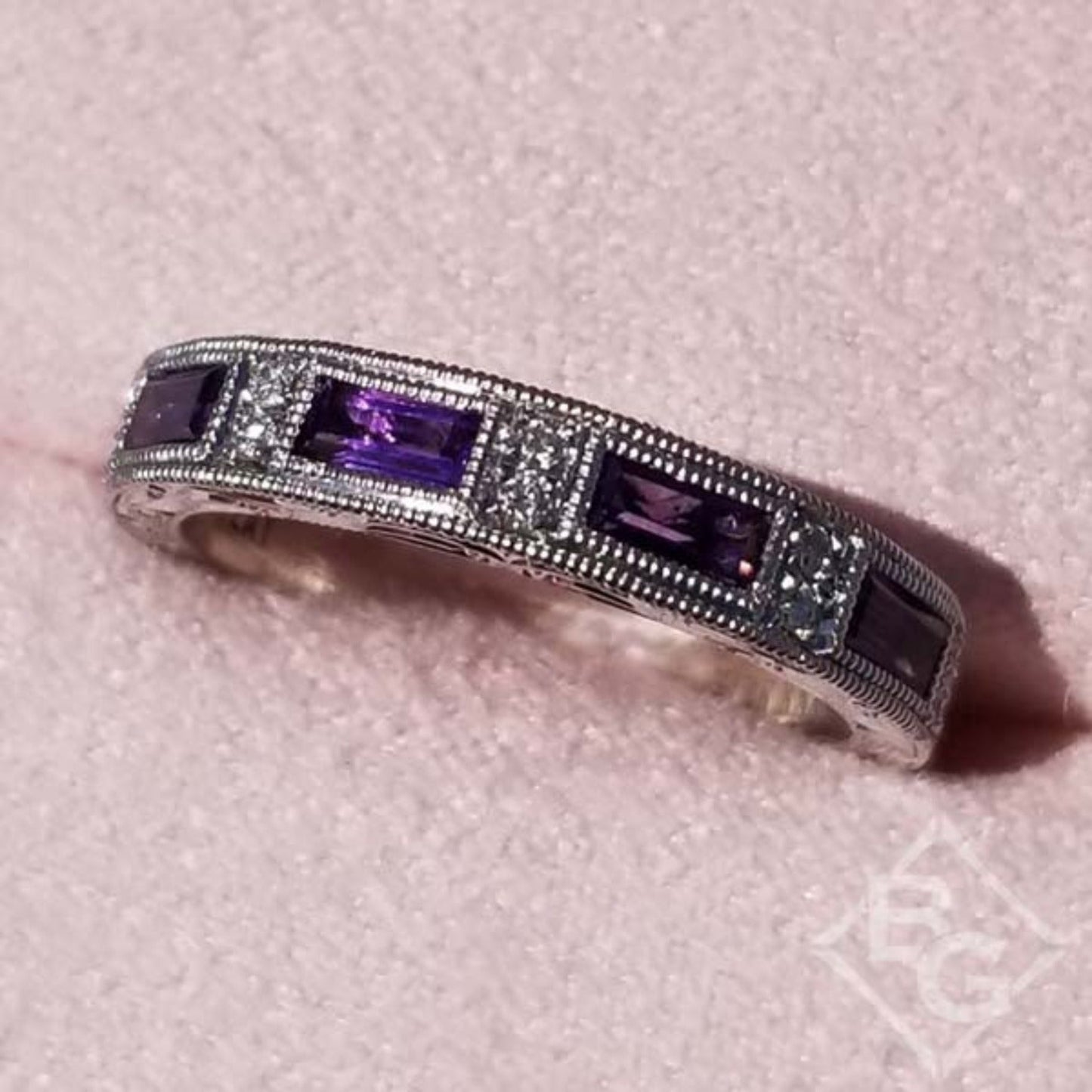 Kirk Kara White Gold "Charlotte" Baguette Cut Purple Amethyst Diamond Wedding Band Top View In Box