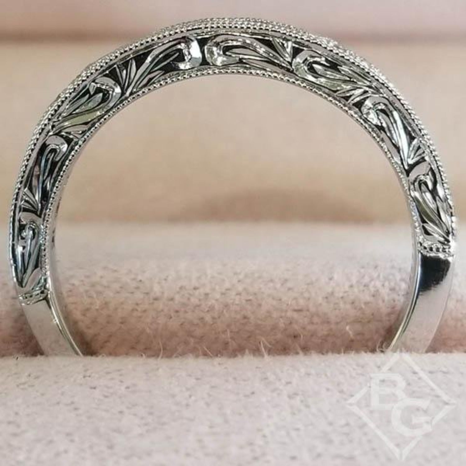 Kirk Kara White Gold "Charlotte" Pink Sapphire Round Cut Diamond Wedding Band Side View In Box