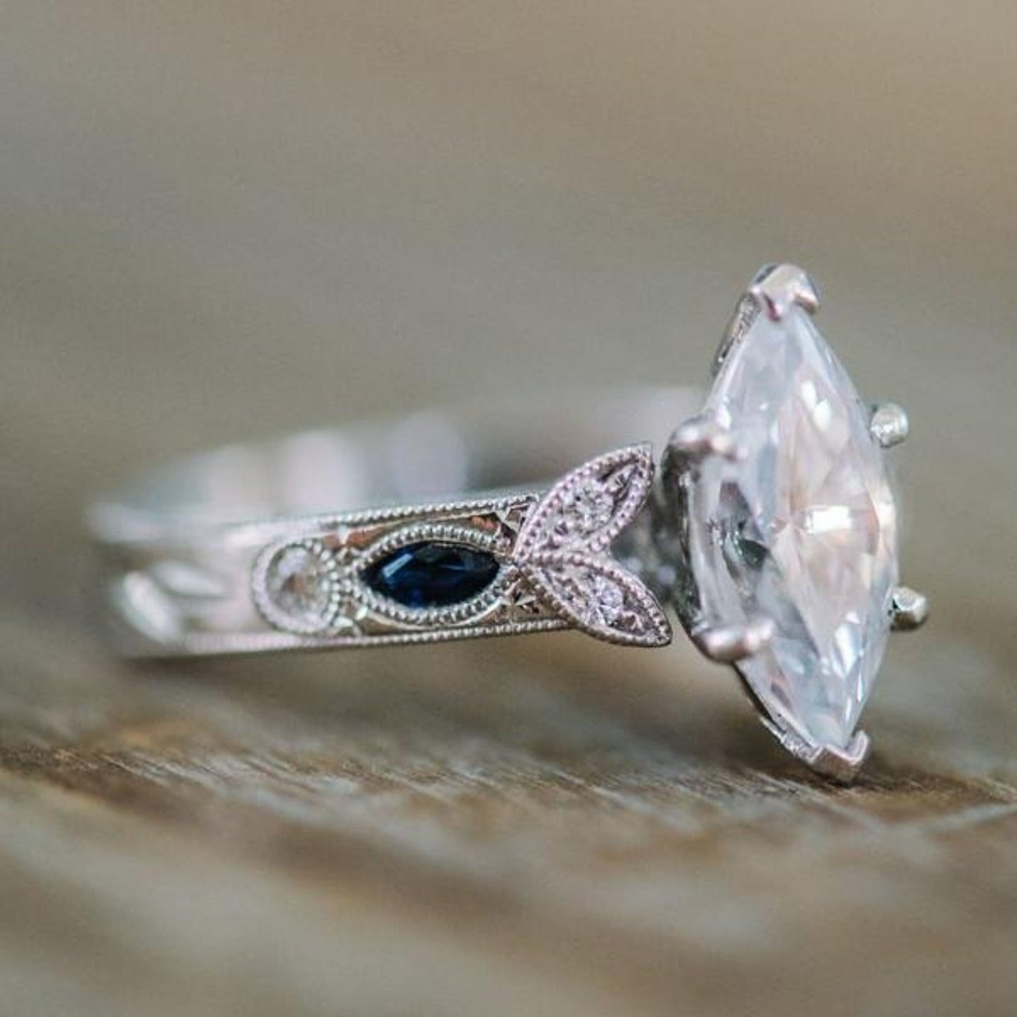 Kirk Kara "Dahlia" Marquise Cut Blue Sapphire Engagement Ring