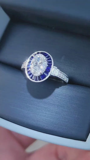 Video of Simon G. Oval Cut Blue Sapphire Baguette Halo Diamond Engagement Ring