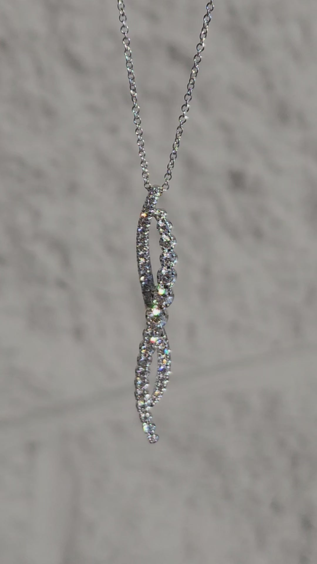 Video of Gabriel & Co. Round Cut Diamond Pave Twist Pendant