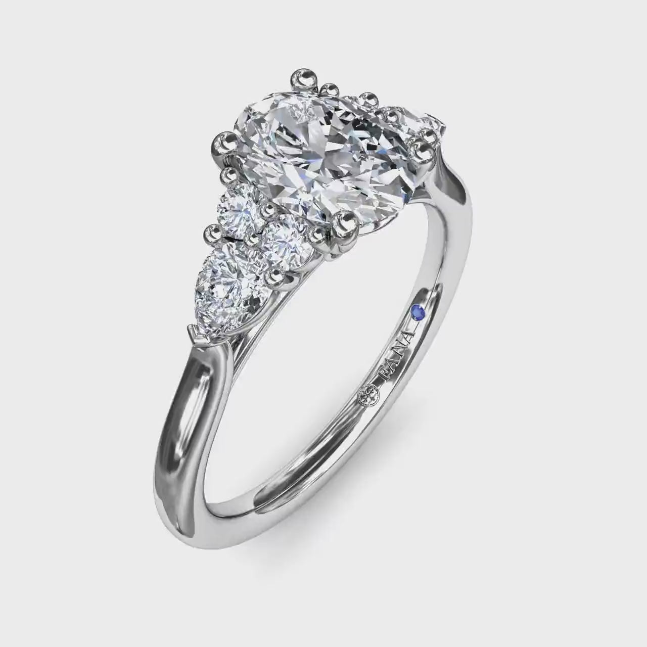 Video of Fana Pear & Round Cut Cluster Side Diamond Engagement Ring