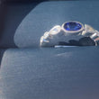 Load and play video in Gallery viewer, Simon G. Oval Cut Bezel Set Blue Sapphire and Diamond Ring Video In Box 
