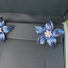 Load and play video in Gallery viewer, Simon G. Blue Enamel Textured Flower Diamond Earrings
