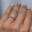 Load and play video in Gallery viewer, Ben Garelick Alara Shared Prong Half-Bezel Diamond Wedding Band on Finger
