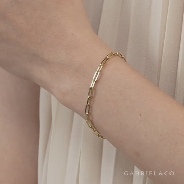 Gabriel & Co. 14K Yellow Hollow Contemporary Paperclip Chain Bracelet on Wrist