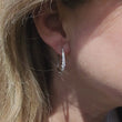 Load and play video in Gallery viewer, Simon G. Small Tapered Round Cut Diamond Hoop Earrings
