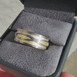 Load and play video in Gallery viewer, Video of Simon G. White &amp; Yellow Gold 8MM Infinity Twist Design Wedding Band
