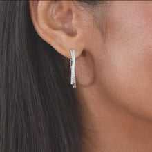 Load and play video in Gallery viewer, Gabriel &amp; Co. Sterling Silver White Sapphire Twisted Bujukan Hoop Earrings
